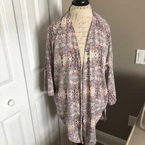 Pink patterned kimono.